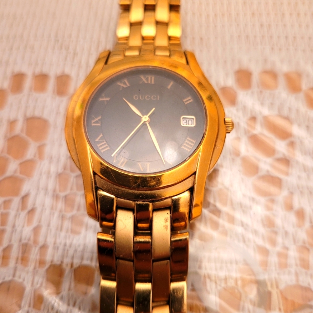 Gucci 5400 m gold dial watch